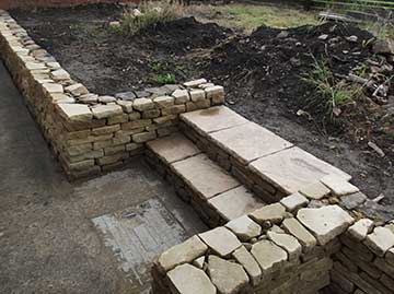 Garden wall with steps